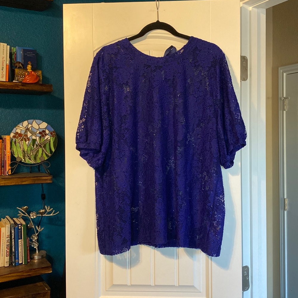 Royal blue lacy top with bow in the back!